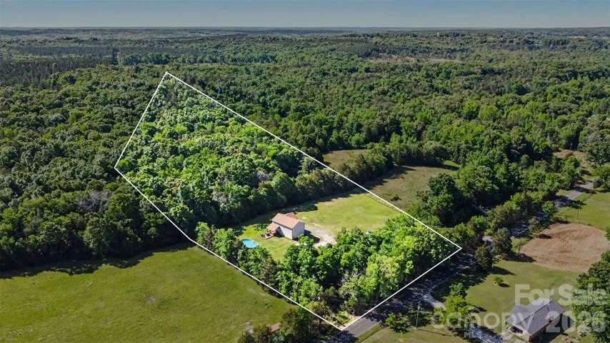 Welcome Home! 6.3 acres of beautiful land!