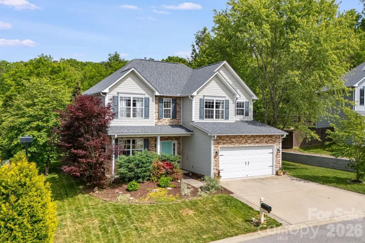 Stunning 3/2.5 home on over a quarter acre lot that lives large, just a 10 minute drive from Downtown Asheville
