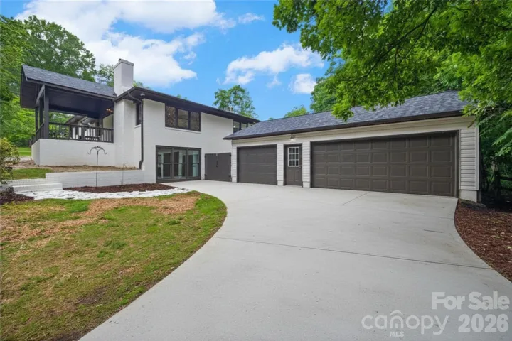 Enjoy an oversized 3-car garage with an extra heavy slab poured to withstand car lifts.