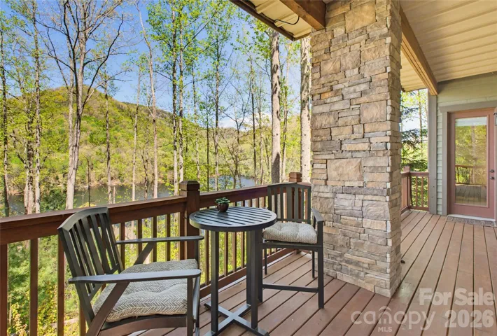Condo overlooks Lake from covered porch
