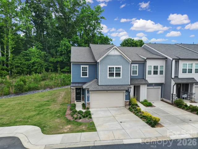 Front Exterior - End Unit, 2 Car Garage, Private Backyard, Next to Green Space