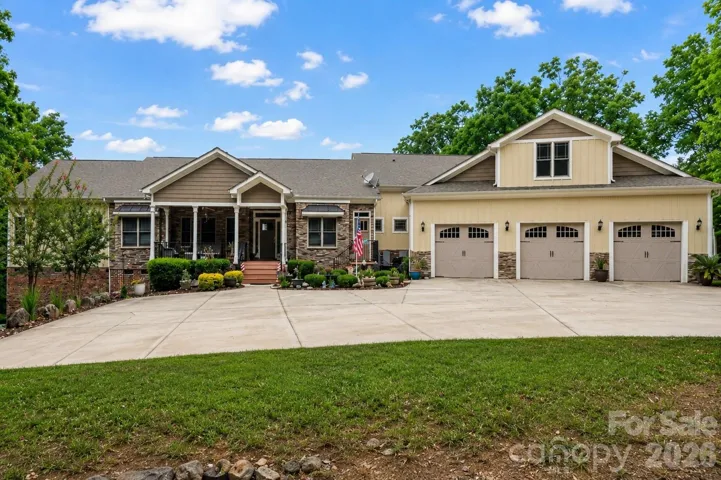 Beautiful custom-built home offering impressive curb appeal and elevated lake community living