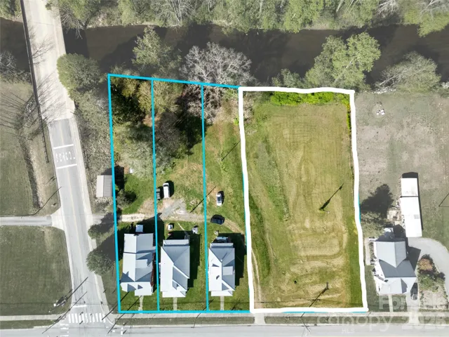 Subject property highlighted in white approximately. See survey