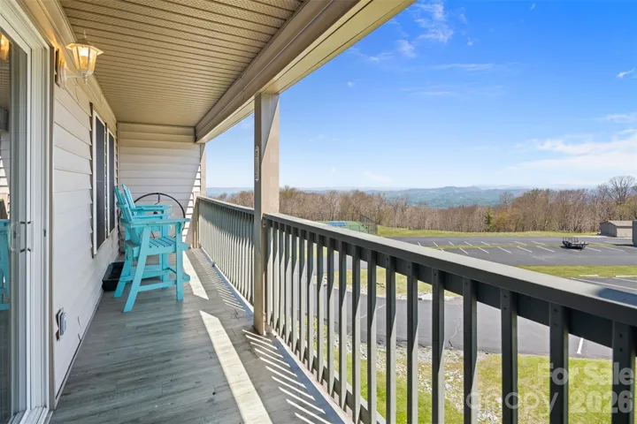 Take in the Long Range Layered View from the Covered Porch