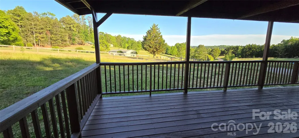 Large covered front porch with peaceful views