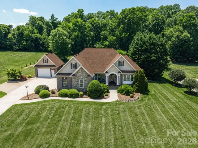 Custom brick & stone home in Dobbs Valley