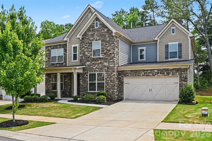 Front exterior of the home with two car garage.