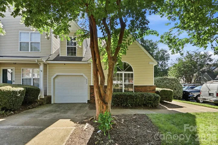 Welcome home to this lovely end-unit townhouse on a corner lot!