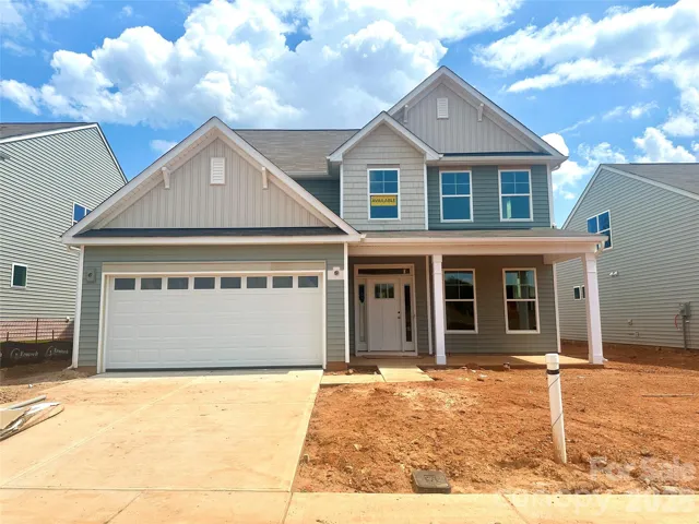 Homesite 164 features a Cypress C floorplan with front-load garage.