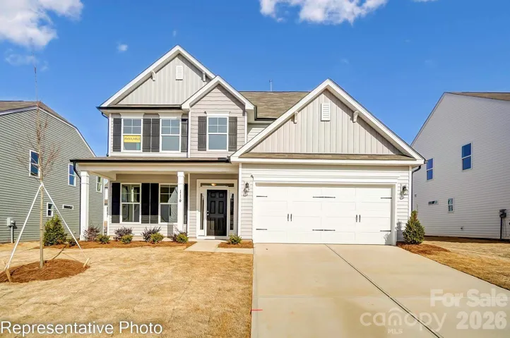 Homesite 164 features a Cypress C floorplan with front-load garage.