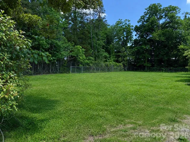 .2 Acres Flat lot with city water and city sewer.