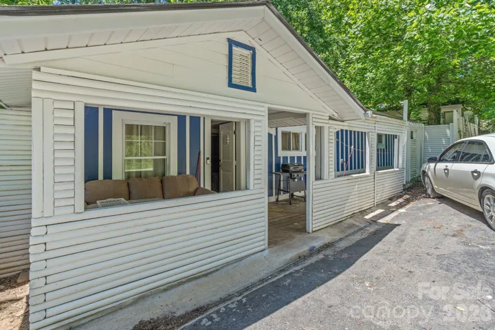 Exterior with parking pad in front