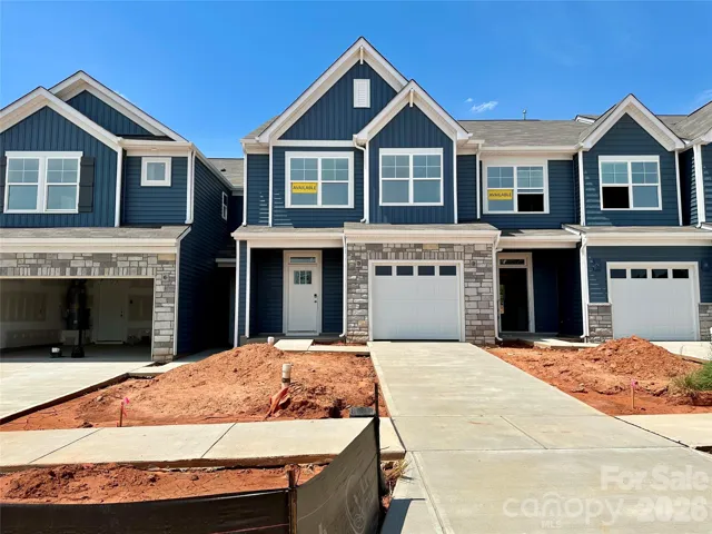Homesite 4 features an Ashland E floorplan