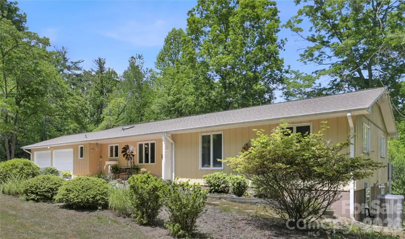 House Front from the Right Side. One level living with a great basement space as well.!