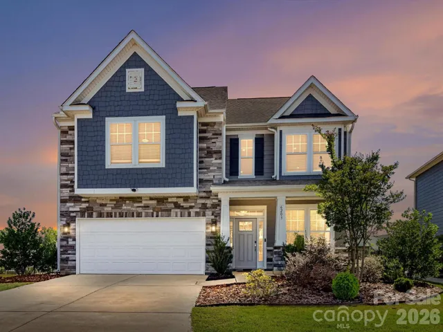 Twilight View of Home located on Cul-de-Sac Street