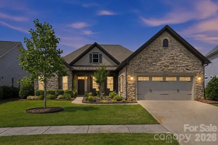 Welcome to 10204 Cove Court in Regency at Palisades, one of Charlotte's most in-demand, upscale Active Adult neighborhoods near Lake Wylie.