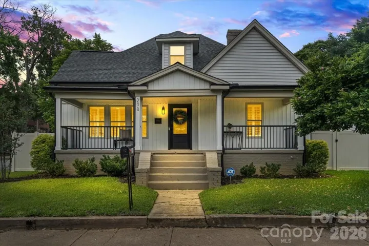 Front exterior at dusk. *Photo has been virtually enhanced.*