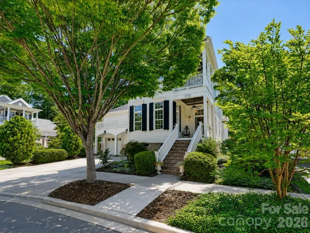 Charming Craftsman-style home in desirable Davidson, NC, featuring timeless architecture, inviting curb appeal, updated interiors, and an unbeatable location just minutes from Downtown Davidson.