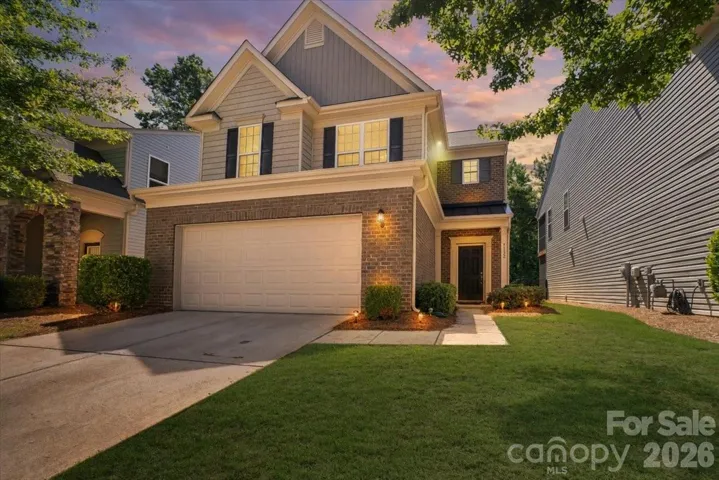 Welcome home. Located in the gated community of Park South Station, this beautifully maintained residence combines low-maintenance living, resort-style amenities, and an unbeatable South Charlotte location
