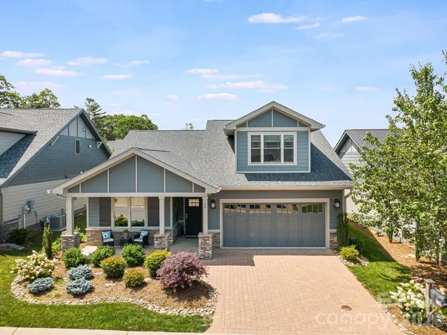 Impressive curb appeal shines in this stunning aerial view of the property.