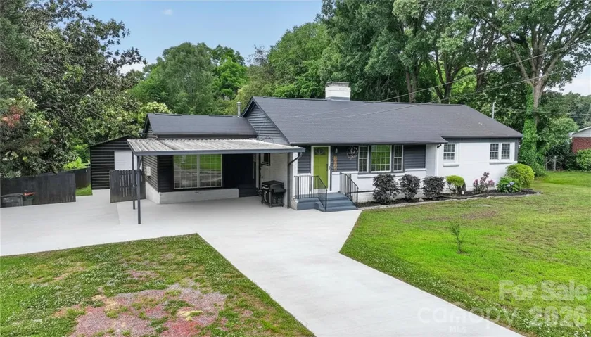 Front Photo w/Whitewashed Staged Driveway