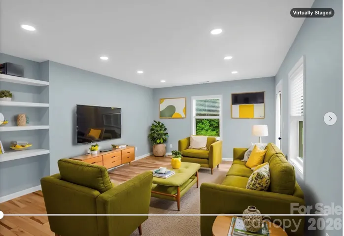 *virtually staged as Den - Config A* Dedicated office/private den off of the primary bedroom with door to back yard