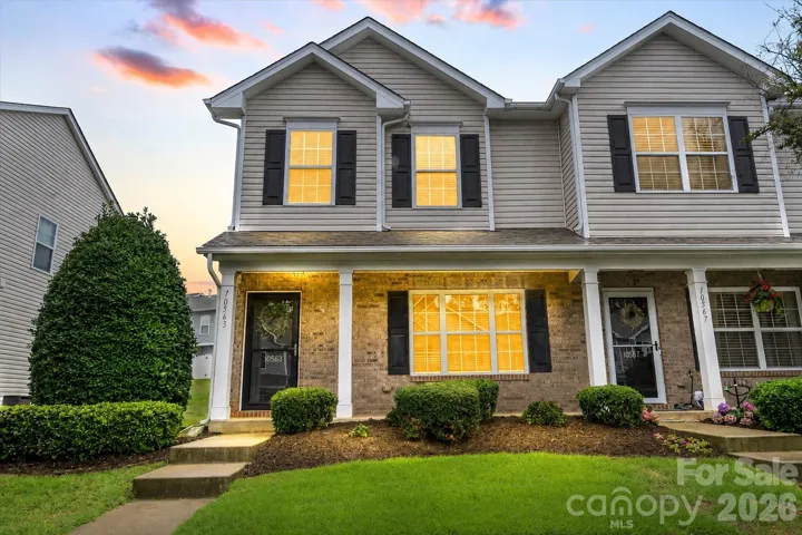 Front exterior at dusk. *Photo has been virtually enhanced.*