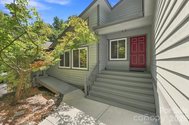 Entry to Main Residence and In-Law Suite - (881 sq. ft. included in the home's total 3,748 sq. ft.}