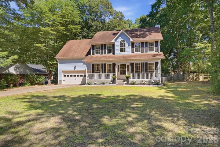 Front elevation with long driveway!