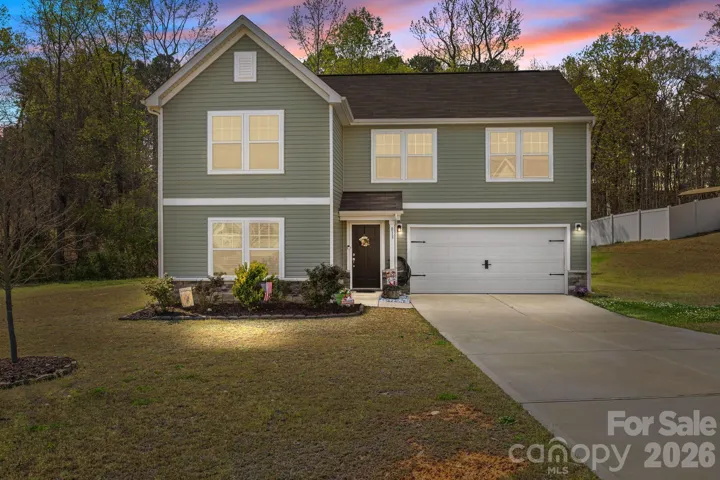 Beautiful two story home in the Grandview neighborhood on a corner lot with almost 1/2 acre!
