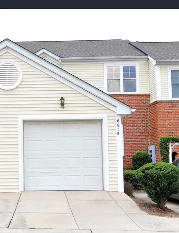 Front of home showcasing garage