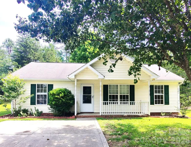 Cute home with covered front sitting porch