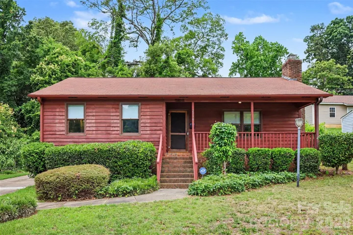 Front exterior of home with covered porch.