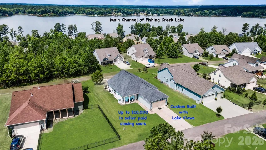 Up to $10,000 in Seller Paid Closing costs, custom built with lake views