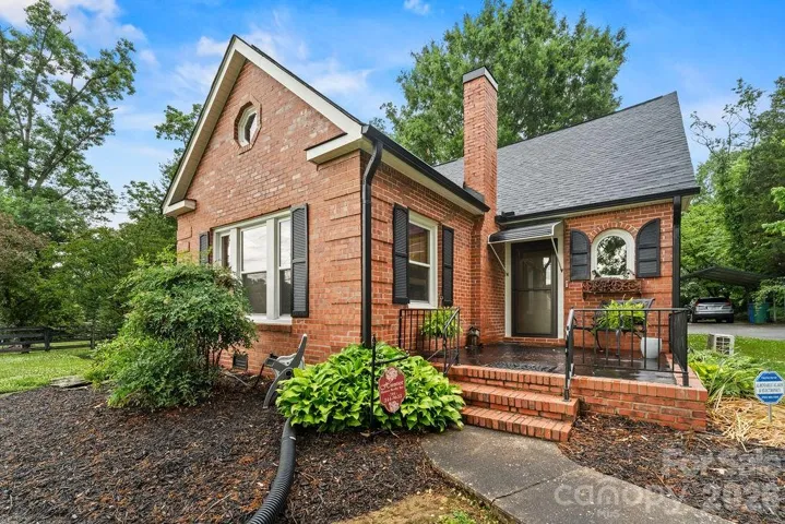 Welcome to 1832 Badin Road.  This charming brick home is ready for a new family!