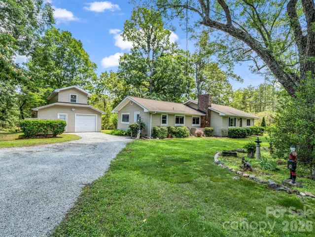 Perfect setting for this farm house property on 1.26 level acres