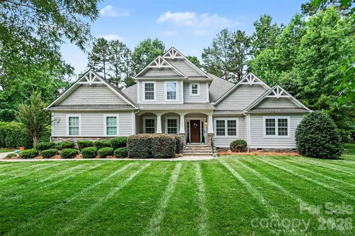 Welcome Home! to this semi-custom 1.5 story in Mint Hill!
