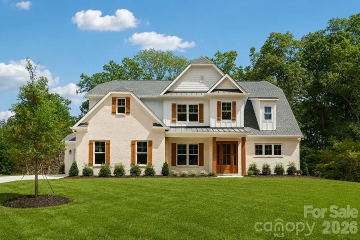 Custom-built brick home situated on a sprawling 2.14-acre lot. Grass will be installed prior to closing.