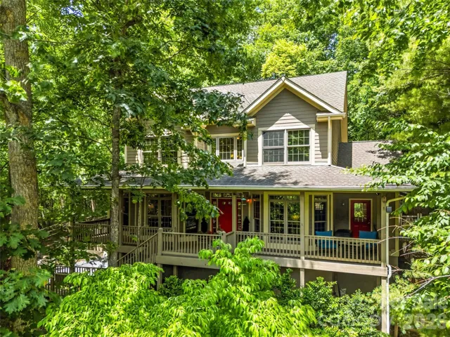 The front of the house with a large covered porch.