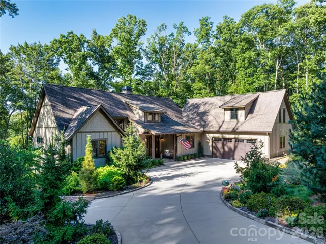 Level approach, ample parking and two car garage