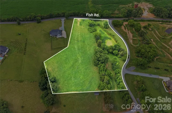 5.2 acre lot with a pond!