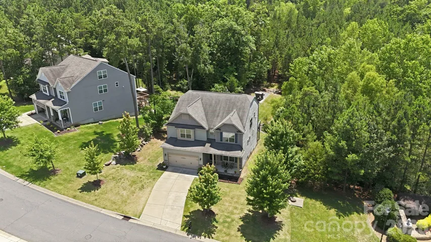 Front of house with one neighbor