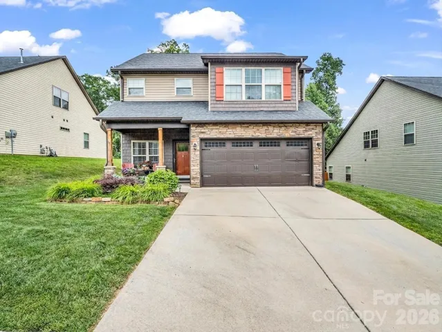 This beautiful home provides a two car garage with plenty of driveway parking as well.