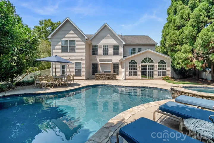 Beautiful pool, spa, and outdoor living space.