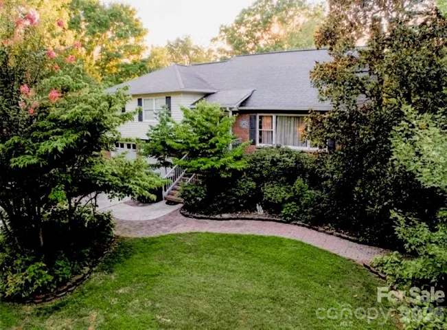 Front Entrance with a wrap around sidewalk