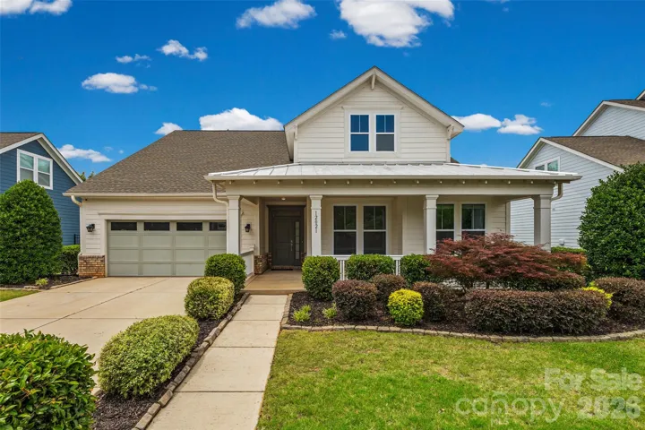 Welcome to 12021 Grey Partridge Drive!  Check out the beautiful landscaping!