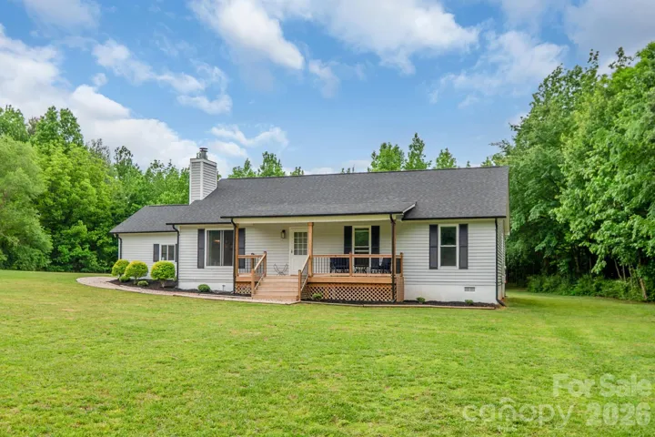 Updated ranch at 7209 Landsford Rd in Monroe on spacious acreage is calling you home
