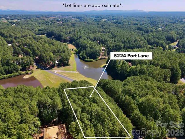 Lot sits on a hill with views of both ponds
