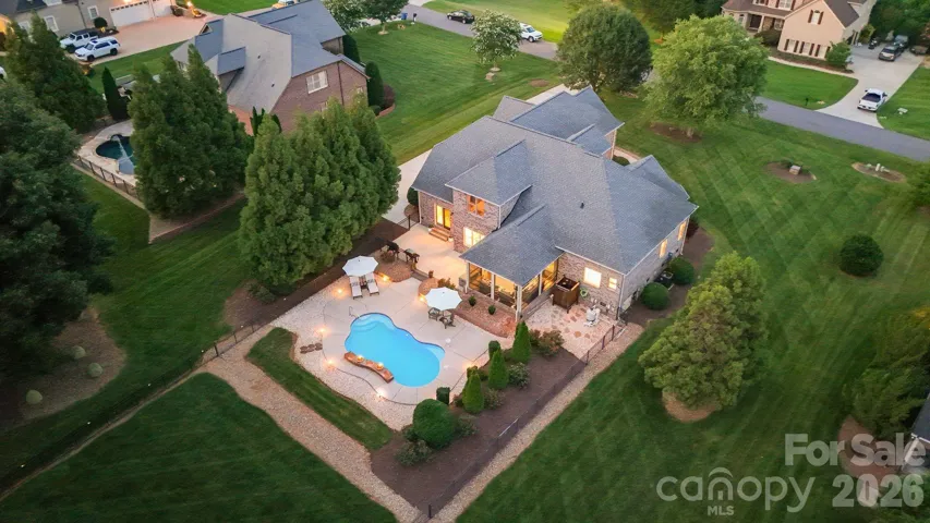 Aerial view showcasing the private backyard oasis.