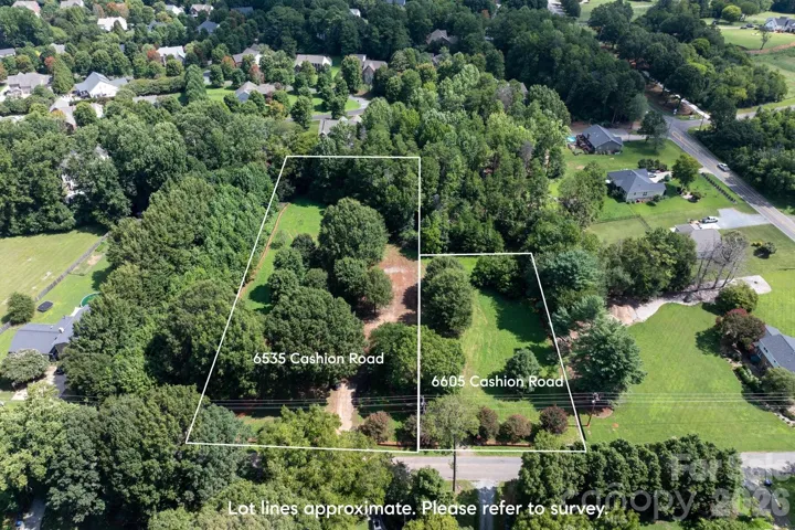 Beautiful and tree lined with nearly 2 acres!